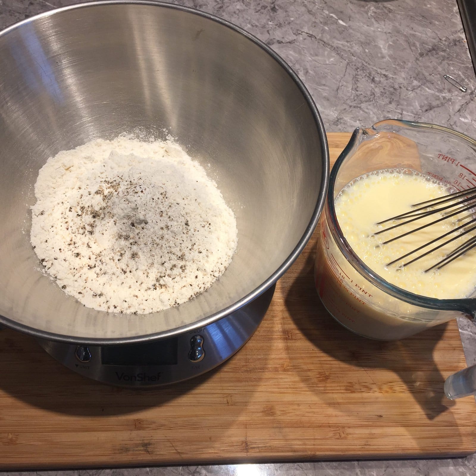 Seasoned flour and eggs whisked into milk