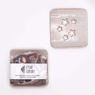 White square ceramic soapdish with star cutouts
