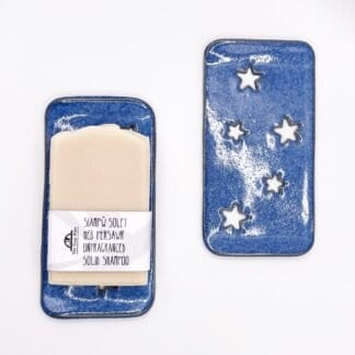 Blue rectangular soapdish with starry cutouts
