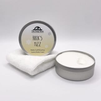 A jar of Buck's Fizz Body Cream