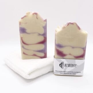 Two bars of pink and lilac soap