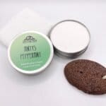 An open tin of peppermint foot cream