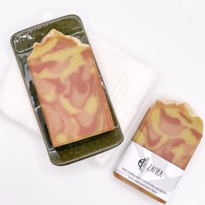 Two bars of orange and red Zafira Soap