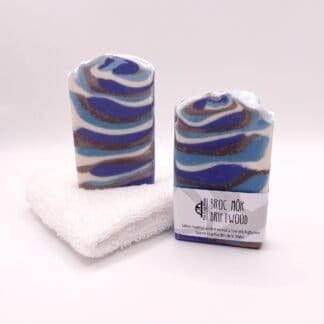 Two bars of blue and brown handmade soap